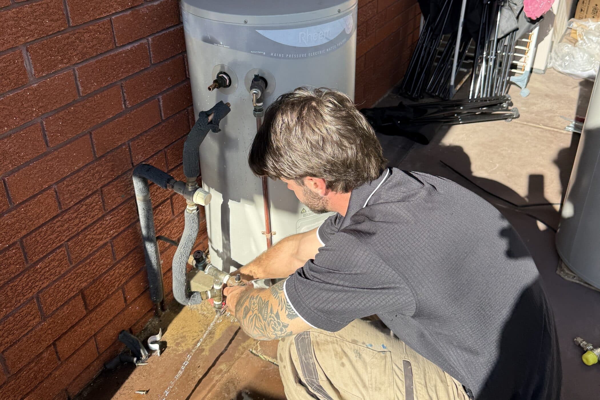 An emergency repair to a burst water pipe